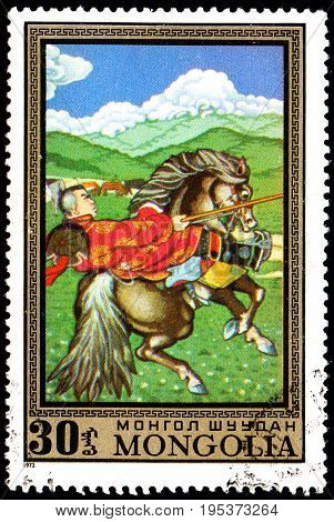 UKRAINE - CIRCA 2017: A postage stamp printed in Mongolia shows Lancer on horseback from the series Paintings by contemporary artists in Ulan Bator Museum circa 1972