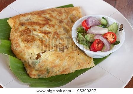Thailand muslim food Martabak or murtabak, stuffed bread, eat with acar.