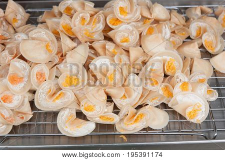 Khanom Buang are the names of the treats on the market, Thailand.