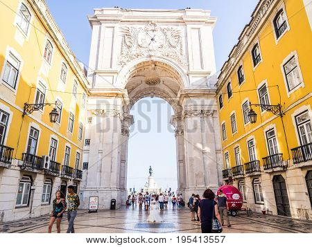 LISBON PORTUGAL - JUNE 13 2017: The Rua Augusta Arch a triumphal arch-like historical building in Lisbon Portugal on the Praca do Comércio.