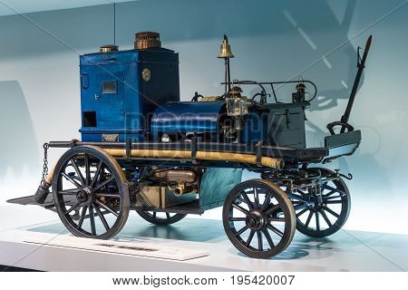 STUTTGART GERMANY- MARCH 19 2016: Daimler motorized fire-fighting pump (Daimler Motor-Feuerspritze) 1892. Mercedes-Benz Museum.