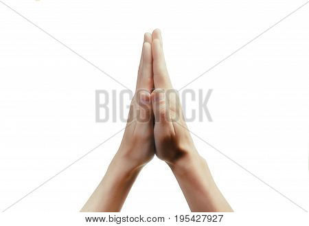 Two old palm are clasped all together over whte background. Praying woman woth her hand clasped.