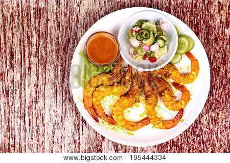 Charcoal Boiled ,prawn Satay Served With Side Disk.