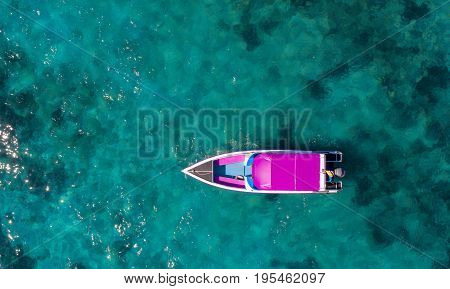 Speed boat in the sea.Aerial view. Top view.amazing nature background.The color of the water and beautifully bright.