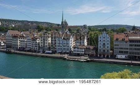 ZURICH, SWITZERLAND - JULY 04, 2017: View of historic Zurich city center, Limmat river and Zurich lake, Switzerland. Zurich is a leading global city and among the world's largest financial center