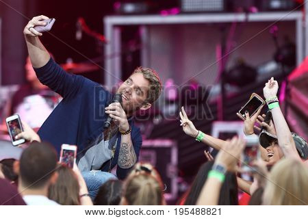 WANTAGH, NY-JUL 14: Brett Young performs during the You Look Good World Tour at Northwell Health at Jones Beach Theatre on July 14, 2017 in Wantagh, New York.