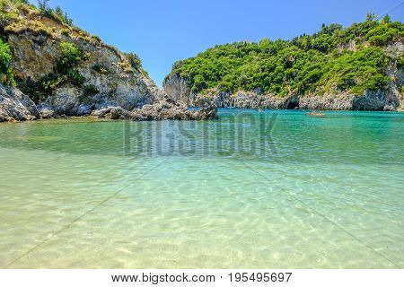 View on the bay and beach Paleokastritsa with crystal sea water on the Island Corfu Greece.