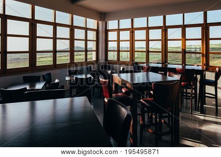 Interior Of Empty Restaurant On Sunny Day