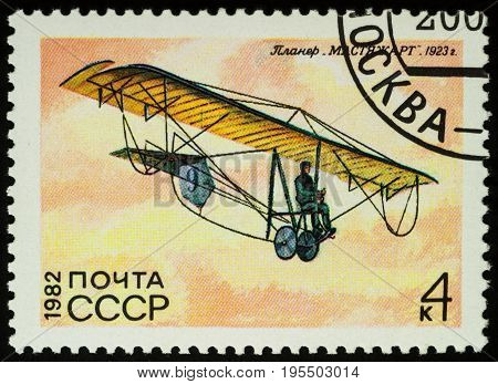 Moscow Russia - July 16 2017: A stamp printed in USSR shows old glider Mastyazhart by Ilyushin (1923) series "History of Soviet Gliders" circa 1982