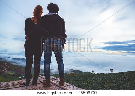 Lover Men and women Asia travel relax. Morning atmosphere nature Forests mountains. Phu Thap Buek Thailand