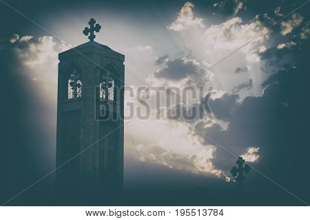 The Chatolic Church In The Light Of Cloudy Sunset