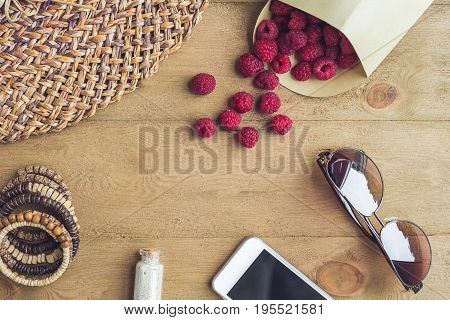Summer Holiday, Vacation, Relaxation Concept. Raspberries, Straw Hat, Smartphone, Sunglasses From Ab