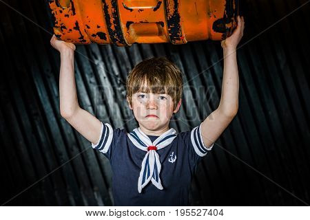 Schoolboy Posing In Sailor Costume With Emotions