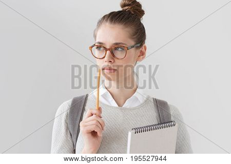 Closeup Portrait Of Good-looking Young Woman Standing Isolated On Grey Background, Wearing Glasses,
