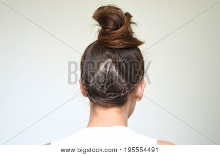 Hairstyle with long hair - young girl on a white background