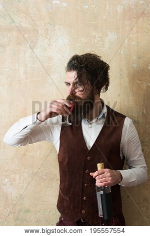 Man Drinking Glass Of Wine