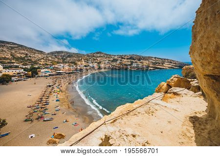 Panorama Of Matala Beach  And Caves On The Rocks, Crete, Greece