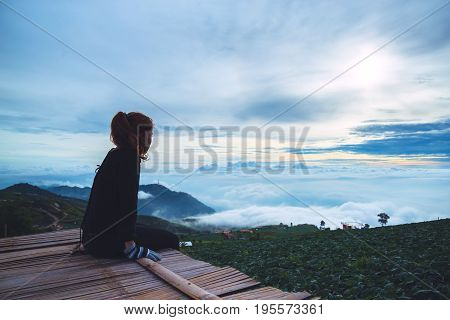 Asian women travel sleep relax. Morning atmosphere nature Forests mountains. Phu Thap Buek Thailand