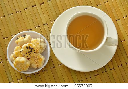 Chinese mini cookies dressing black and white sesame eat with hot tea