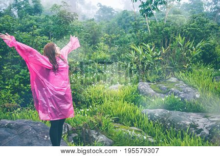 Asian women travel sleep relax. Morning atmosphere nature Forests. walk in the forest rainy season. puhinrongkla Thailand