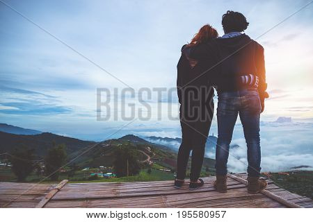 Lover Men and women Asia travel relax. Morning atmosphere nature Forests mountains. Phu Thap Buek Thailand