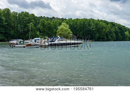LAKE WERBELLINSEE GERMANY - JUNE 25 2017: Marina for yachts. Werbellinsee is a lake in the Barnim district of Brandenburg. During the GDR on the lake the largest Young Pioneer camp was located.