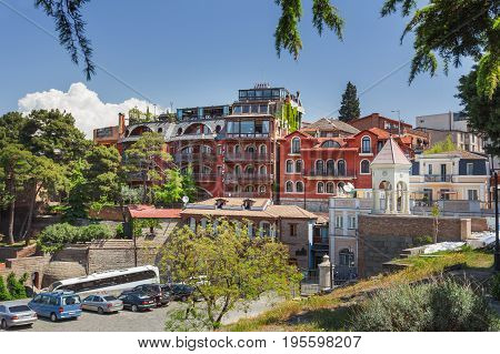 TBILISI GEORGIA - May 01 2017. Tiflis Metekhi Hotel in old town from Metekhi Church of the Dormition of the virgin.