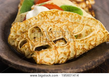Pancakes Sutffed With Ham, Cheese, Tomatoes And Spinach