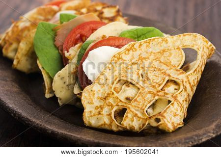 Pancakes Sutffed With Ham, Cheese, Tomatoes And Spinach