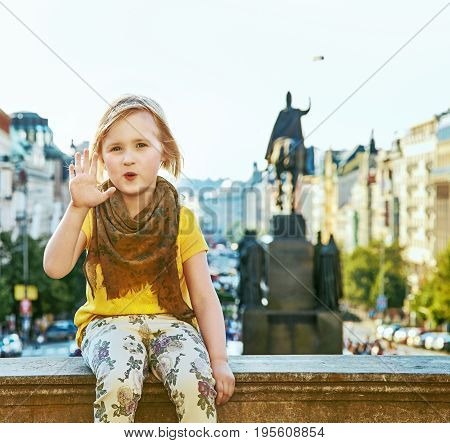 Child On Vaclavske Namesti In Prague Czech Republic Handwaving