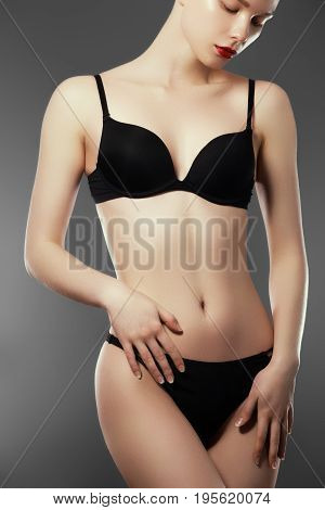 Beautiful Slim Woman's Body. Perfect Slim Toned Young Body Of The Girl. Fitness Or Plastic Surgery A