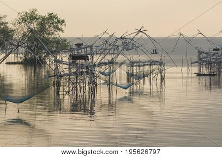 Landscape of Sunrise at Pak Pra lake Fishing had become a major means of survival as well as a business venture Pattalung Thailand.