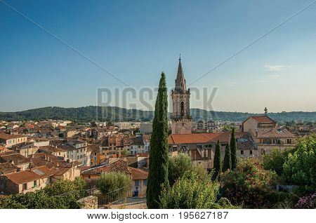 View of the lively and gracious town of Draguignan from the hill of the clock tower, under the colorful light of the sunset. Located in the Var department, Provence region, southeastern France