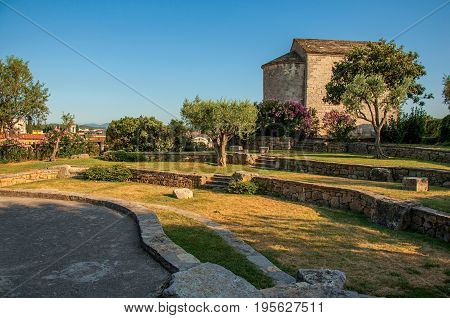 View of the tower clock garden on top of the hill in the light of sunset, over the lively and gracious town of Draguignan. Located in the Var department, Provence region, southeastern France