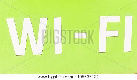 Wi-fi Available here sign. Wi-Fi inscription on green background