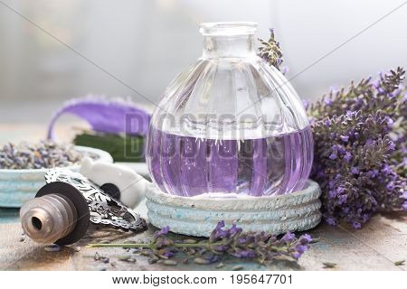 Nature cosmetics handmade preparation of essential oils perfume creams soaps from fresh and dried lavender flowers French artisanal boutique home style