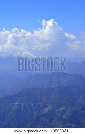 View of Himalayan Mountain Range with Majestic Clouds