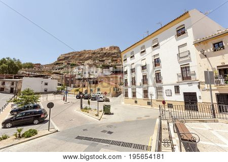 Square in the old town of Lorca with the view of medieval castle on top of the hill. Murcia province Spain