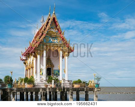 Wat Hong Thong a temple built on a concrete platform at the coast of Chachoensao in Thailand after the sea started to reclaim the area of the original temple several decades ago as a result of erosion.