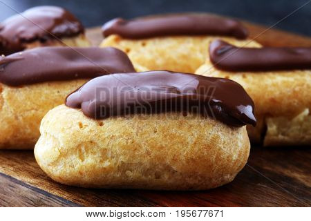 Traditional French Dessert. Eclair With Chocolate Icing. Pastery Concept