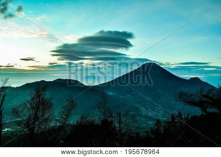 Sindoro volcano in central Java during sunrise on Sikunir hill