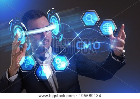 Business, Technology, Internet And Network Concept. Young Businessman Working In Virtual Reality Gla