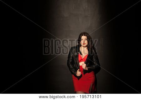 fat woman in red underwear in black room 1