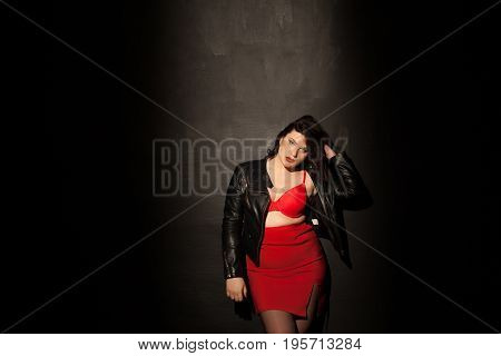 fat woman in red underwear in black room 1