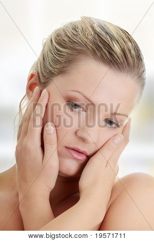 Close-up, portrait of a corpulent woman, isolated on white background