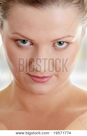 Close-up, portrait of a corpulent woman, isolated on white background