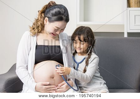 Little Cute Girl Using Stethoscope Check Stomach Her Mother
