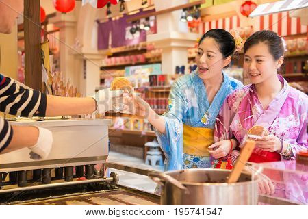 Japanese Woman Buying Pancake
