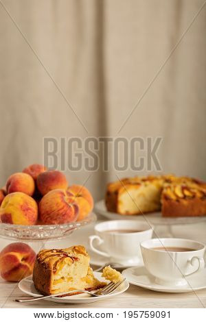 Homemade delicious aromatic peach pie. Selective focus.