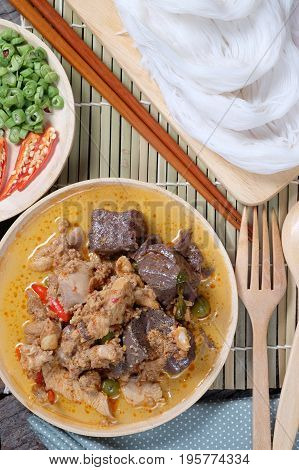 Thai Rice Noodles with Chicken Curry in Coconut Milk (Kanom Jeen Nam Ya Kai) and Thai Iced Tea